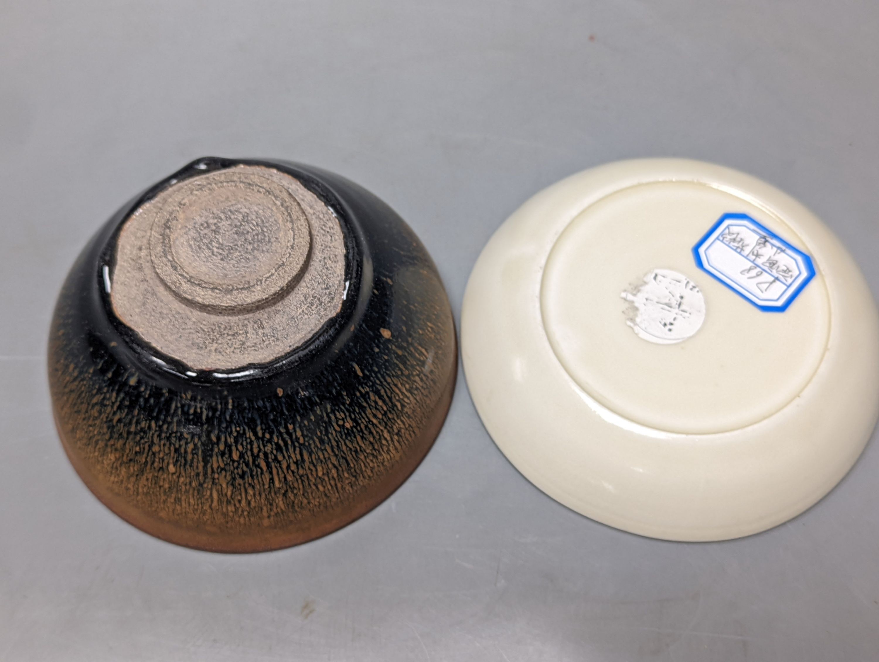 Two Chinese hare’s fur bowls and a Qingbai style dish, 13cm